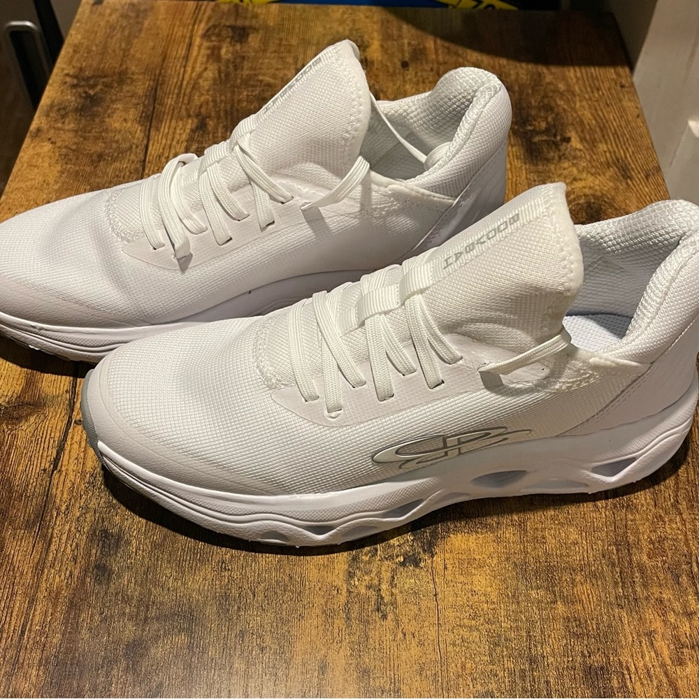 Women’s Boombah softball turf shoes, size 8